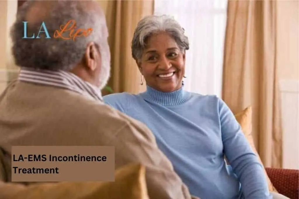 Couple sat smiling at each other - LA-EMS treatment High Wycombe